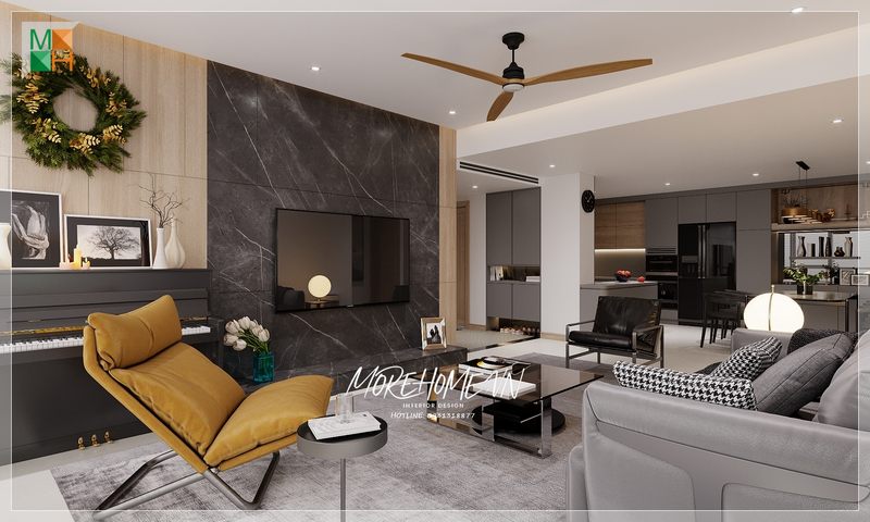 Bộ ghế sofa màu xám và tone nền của căn phòng đã hợp tác để tạo nên một không gian sống chất lượng.