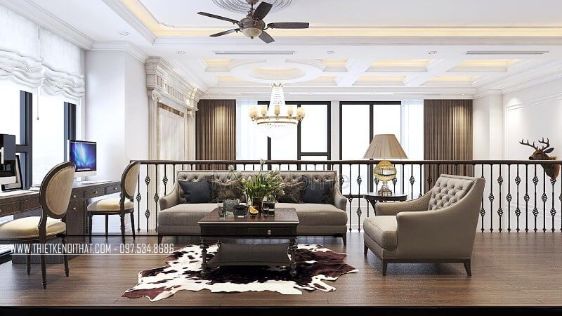 Khu vực sinh hoạt chung tầng 2 của căn hộ Duplex Thanh Xuân Hà Nội được thiết kế với một bàn trà gỗ óc chó hiện đại tinh tế và một sofa tân cổ điển bọc bằng vải cao cấp.